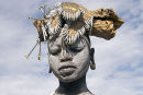 Mursi woman with traditional head dress